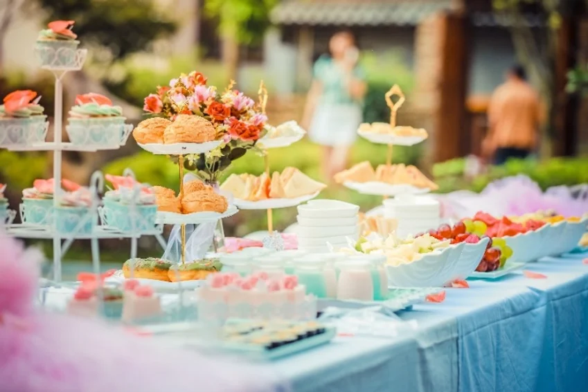Cakes and other eating items are kept on a table at Splash N Bounce event management company in Dubai