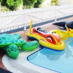 Plastic toys of water animals are kept beside a water pool at Splash N Bounce event management company in Dubai
